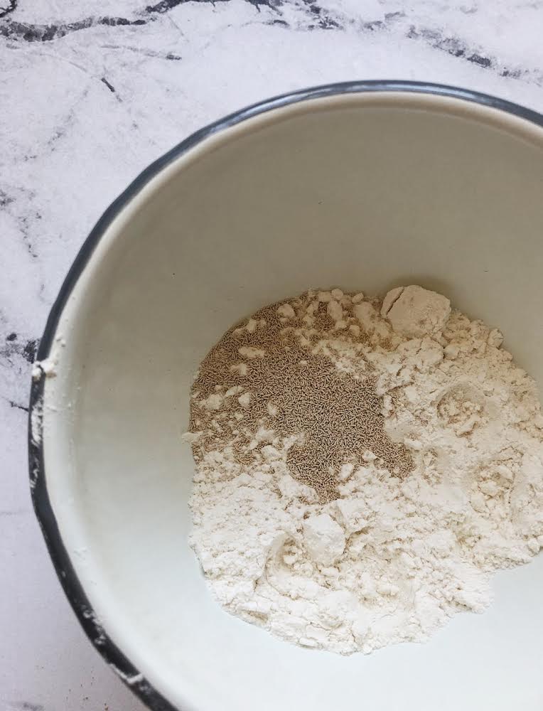 Instant yeast in a bowl of flour. 