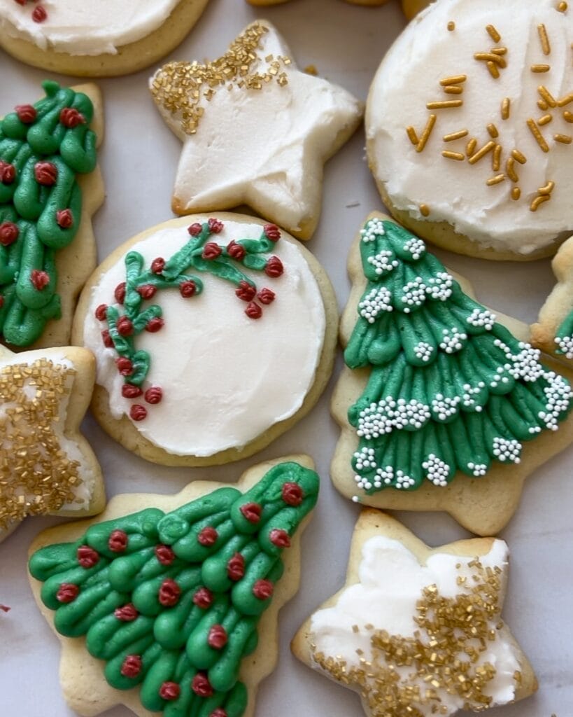 Christmas sugar cookies frosted with buttercream frosting.
