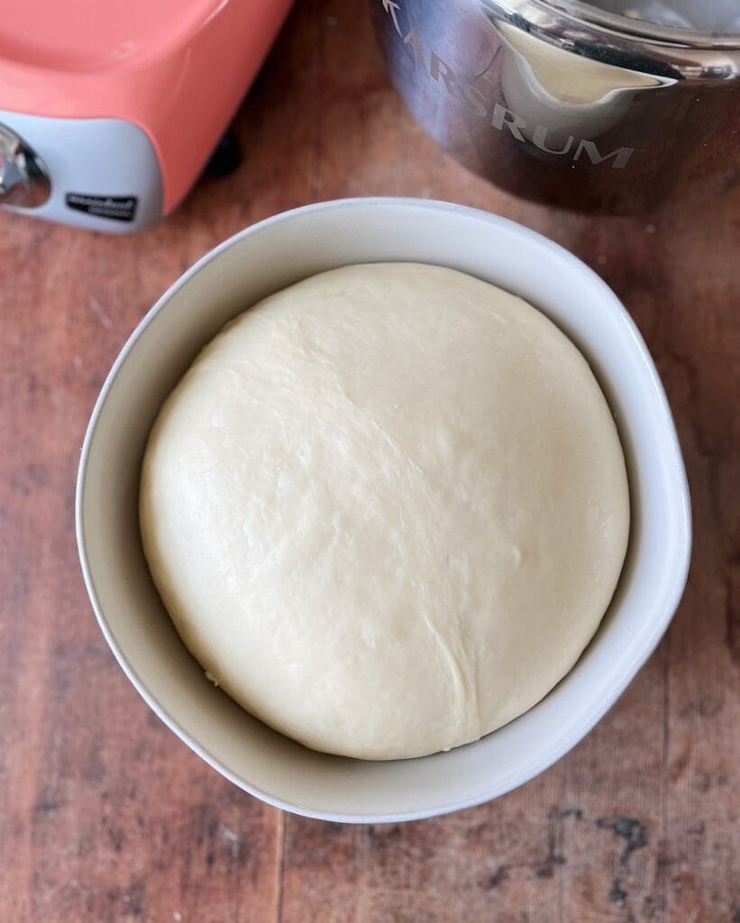 Dough in a bowl after it has doubled in size.