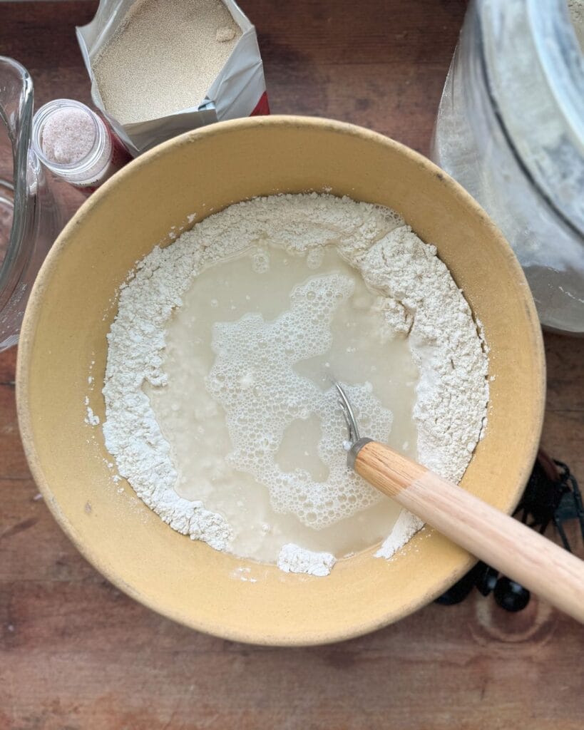 A mixing bowl with flour and water.
