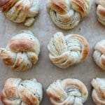 Garlic knots on a baking sheet